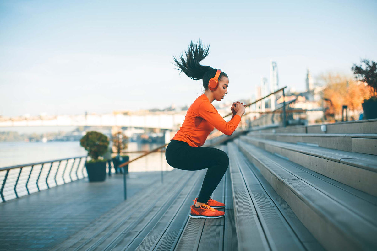 A woman exercising to her full potential after using i-Cann product range for sport recovery 
